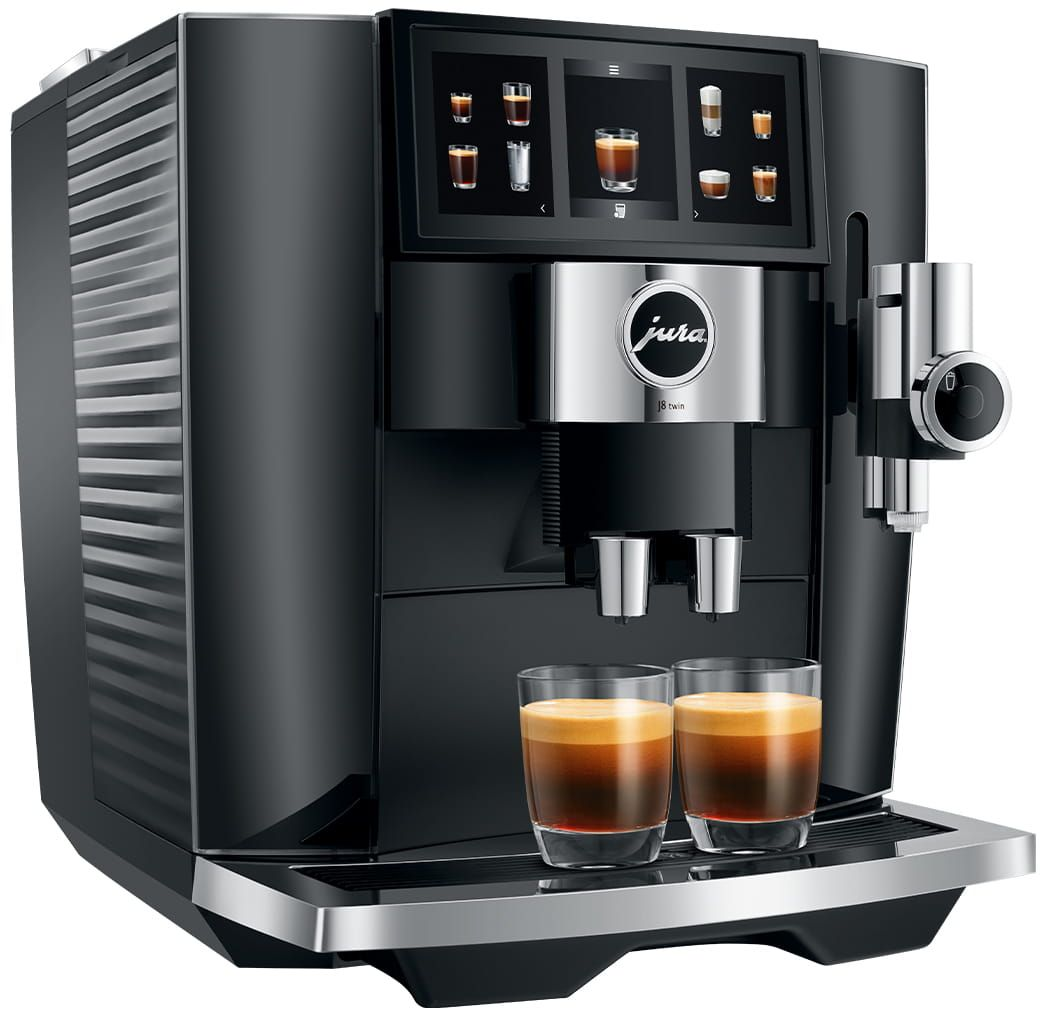 Eine schwarze Espressomaschine mit Touchscreen, zwei Tassen Kaffee und einem silbernen Auslauf.