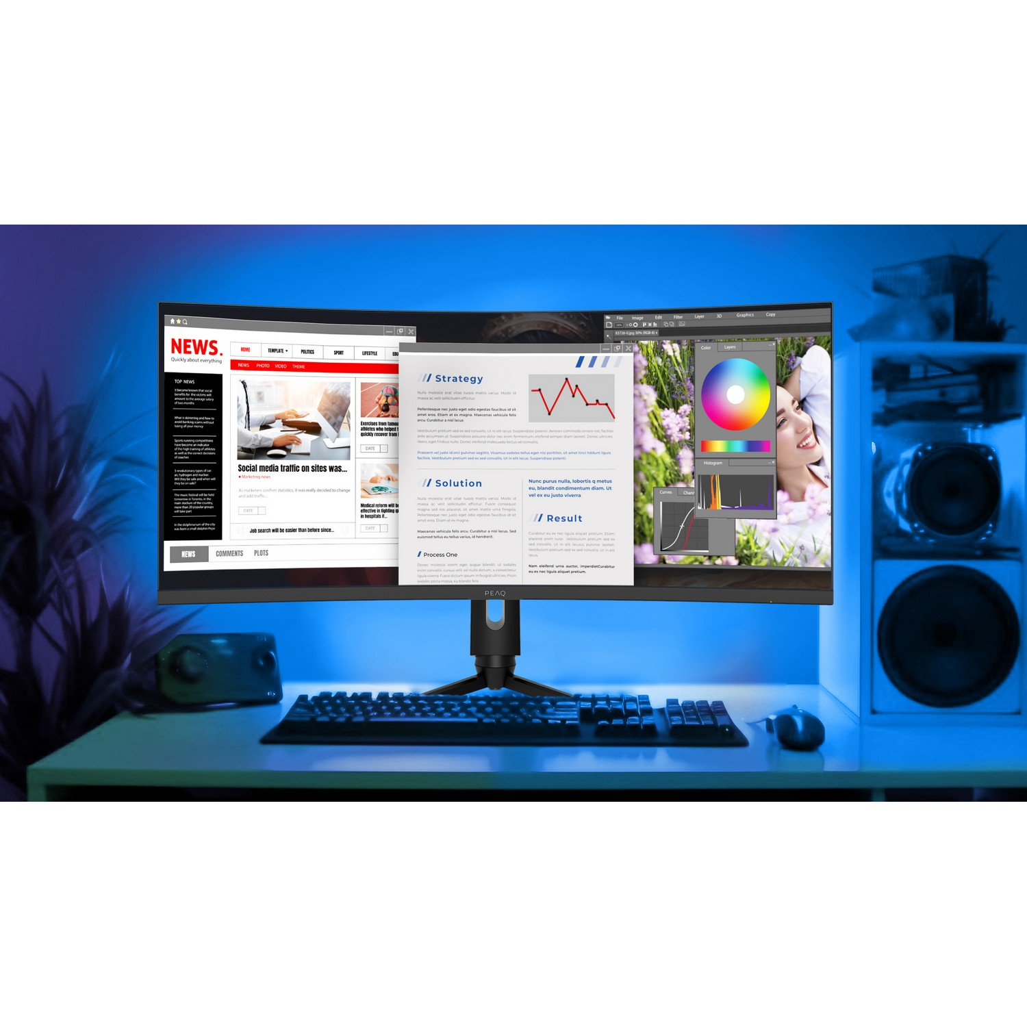 Curved computer monitor displaying a website and graphic design software. Desk has speakers and a mouse.