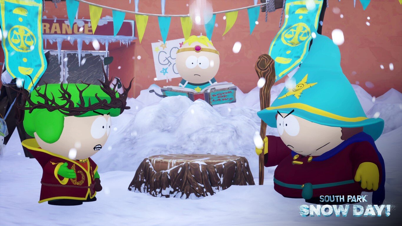 Postacie z South Park w zaśnieżonej scenerii. Cartman jako czarodziej, Kyle i Stan w przebraniach, śnieg i znak.