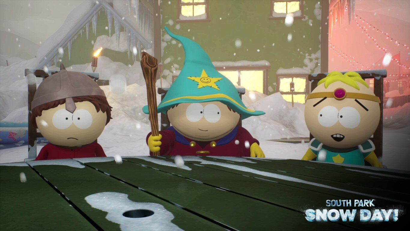 Trzy postacie z South Park siedzące przy zaśnieżonym stole. Jeden to czarodziej, pozostali to rycerze.