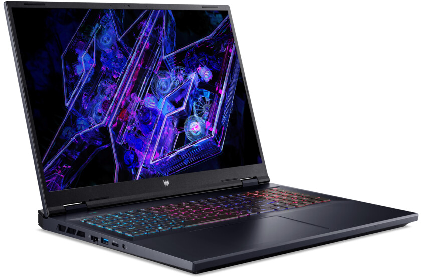 Ein schwarzer Laptop mit bunter Tastatur und einem Bildschirm, der ein geometrisches Design zeigt.