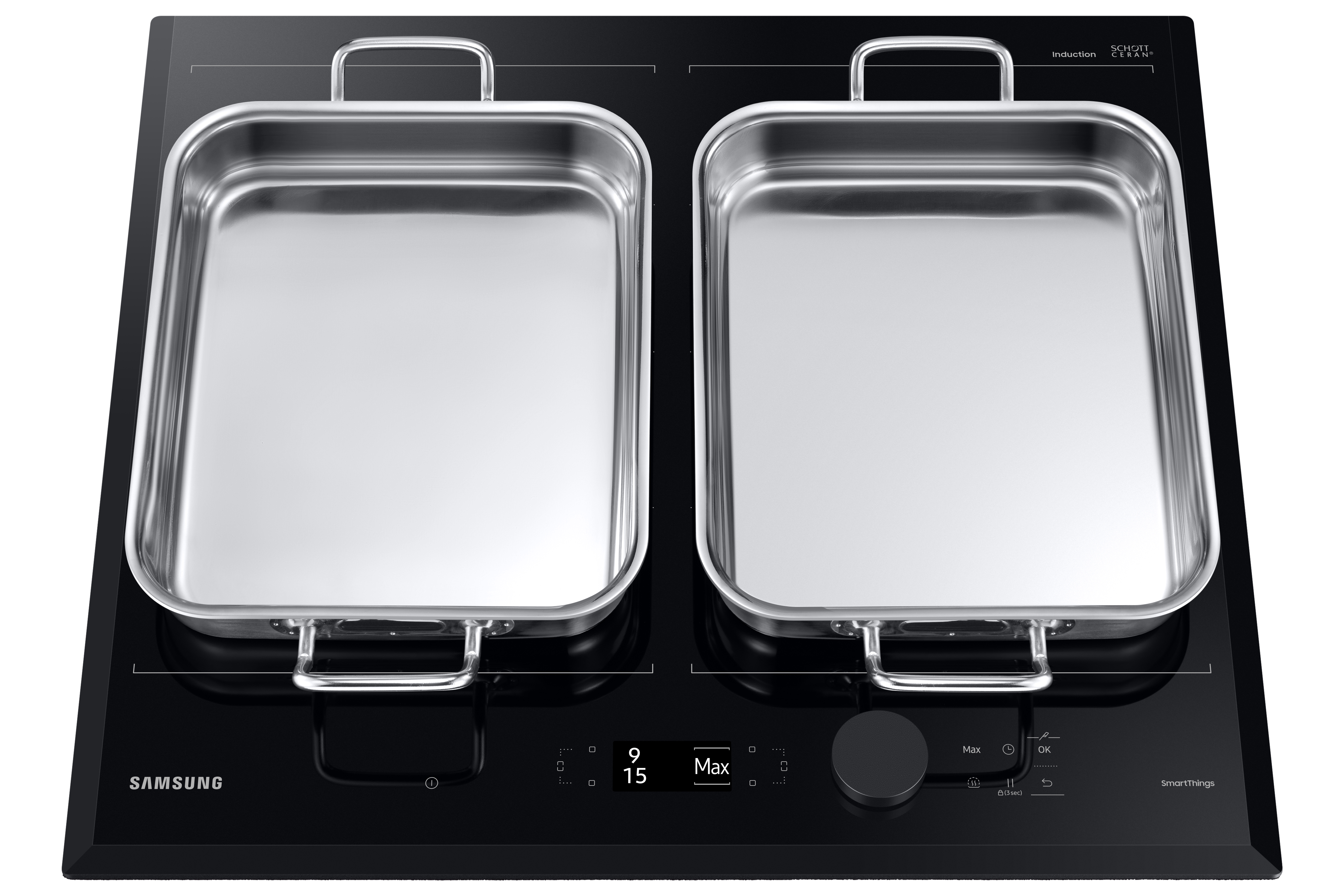 Placa de inducción negra con dos sartenes metálicas. Superficie negra, botones visibles. Fondo blanco.