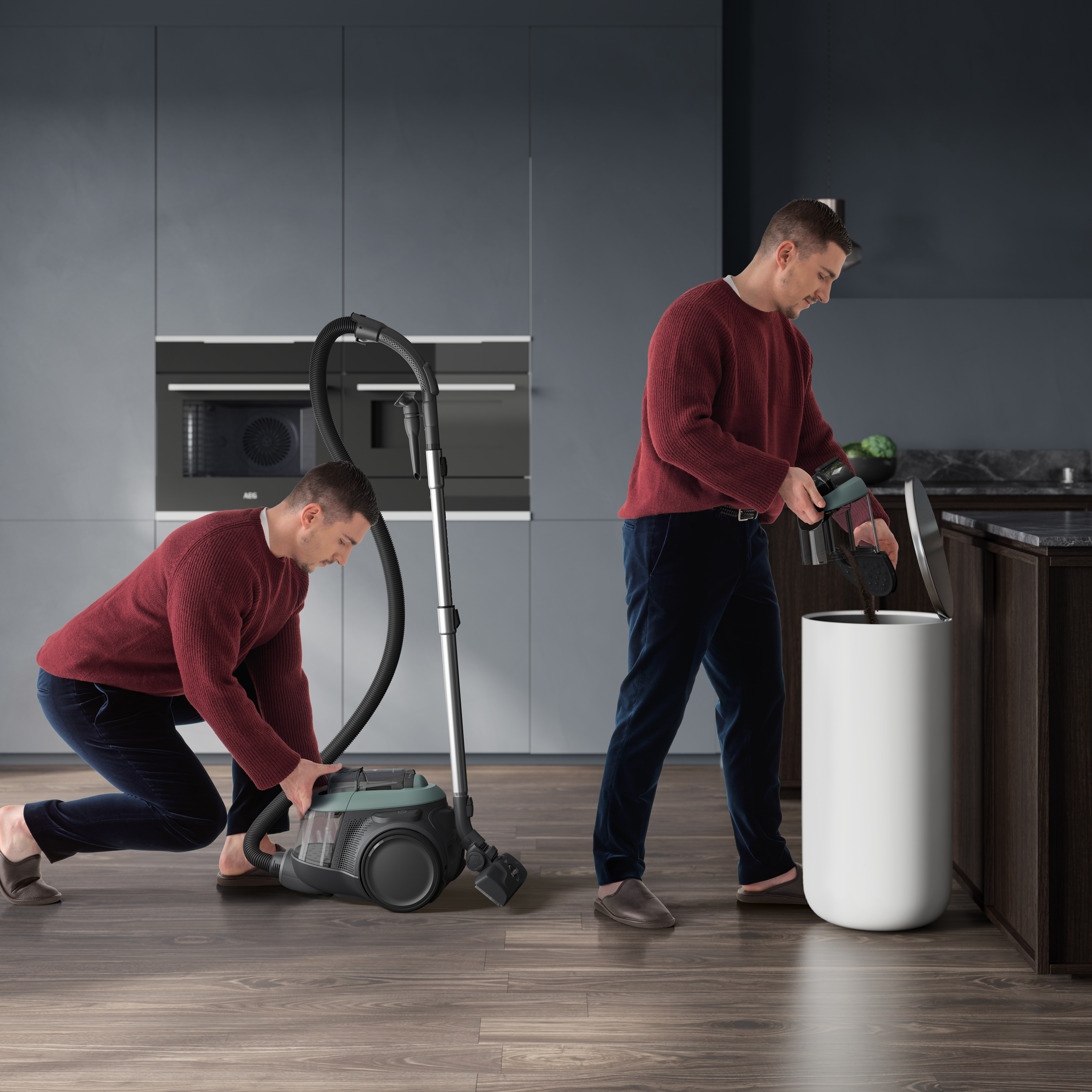 Man emptying a vacuum cleaner, preparing to discard waste into a white cylindrical bin.