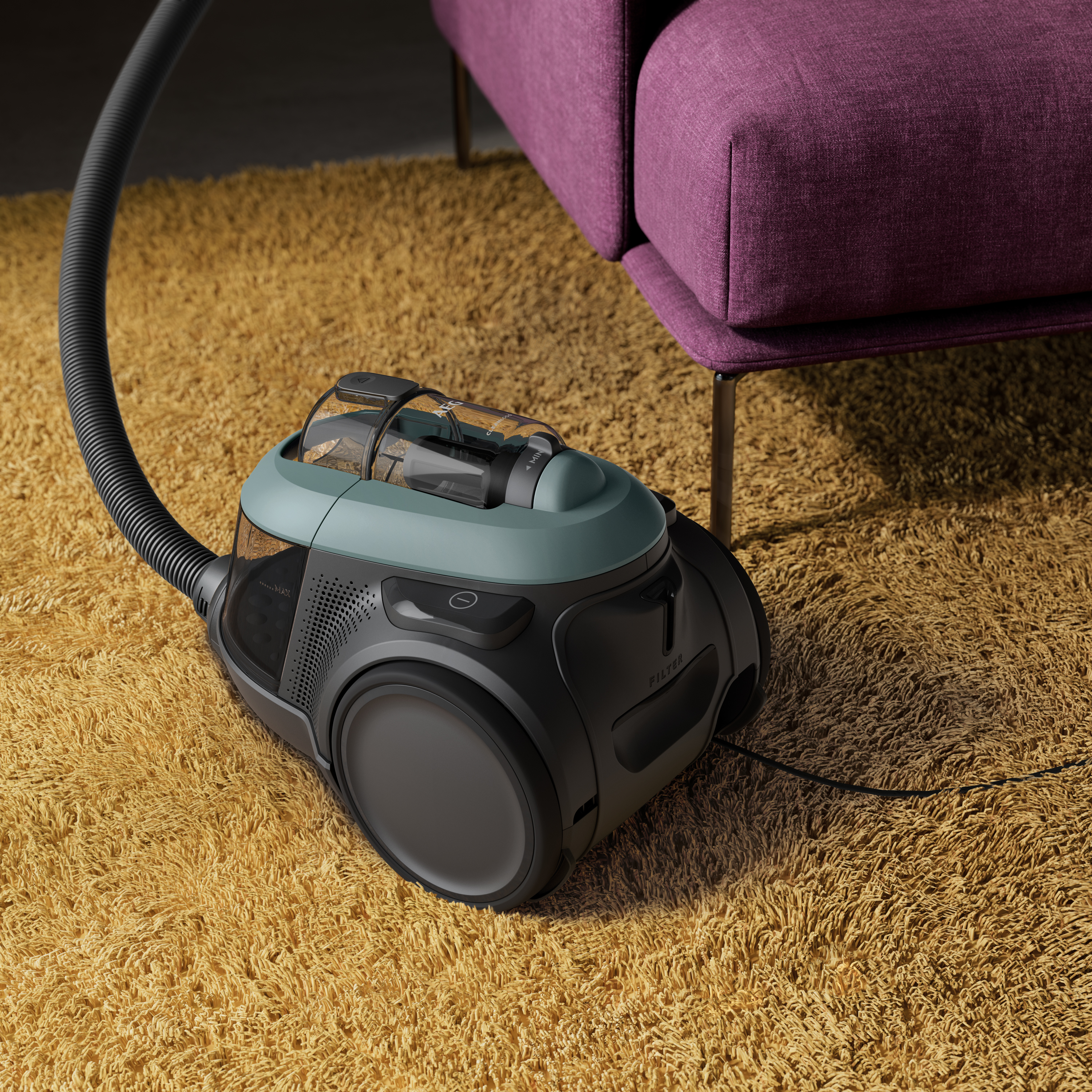 A black and teal vacuum cleaner resting on a yellow shag carpet.