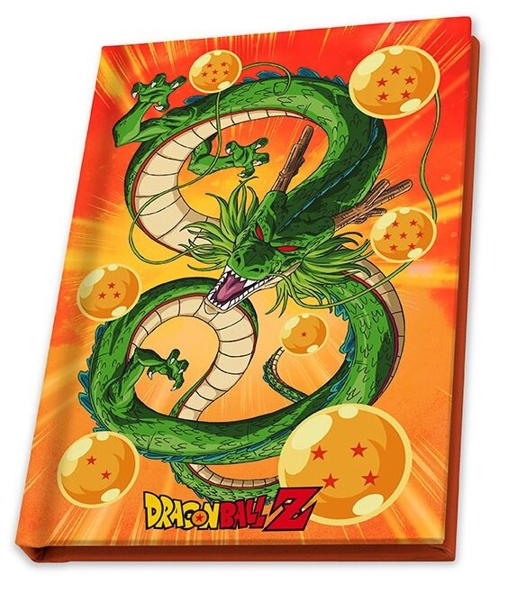 Rodzina rysująca przy stole: dziecko, mężczyzna i kobieta z drukarką.