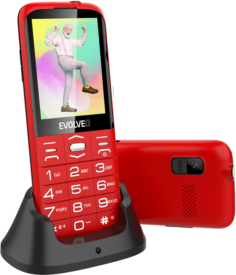 Piros mobiltelefon töltőállványban, nagy gombokkal és idős férfit mutató képernyővel.