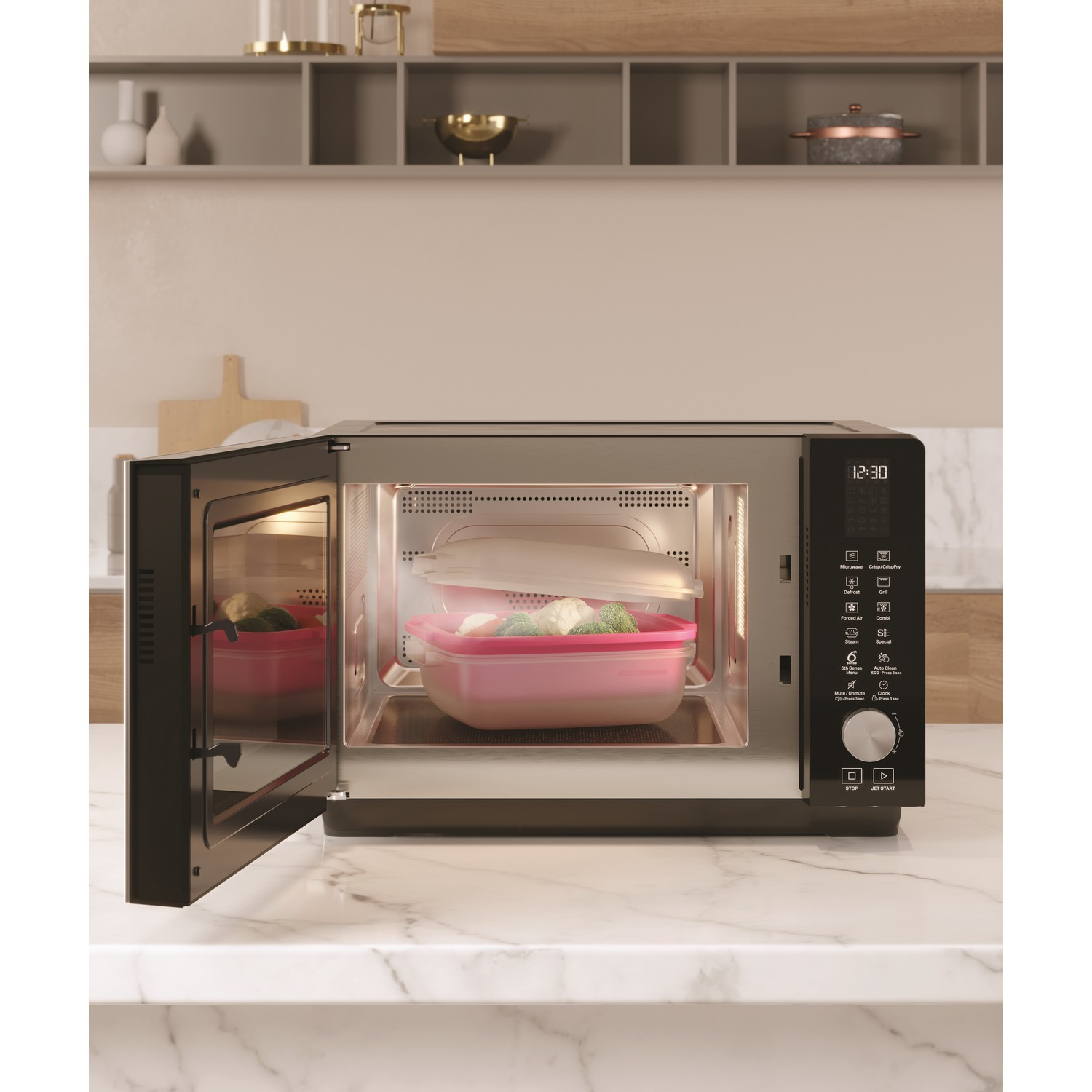 Microwave oven with open door. Inside, pink container with food. White counter.