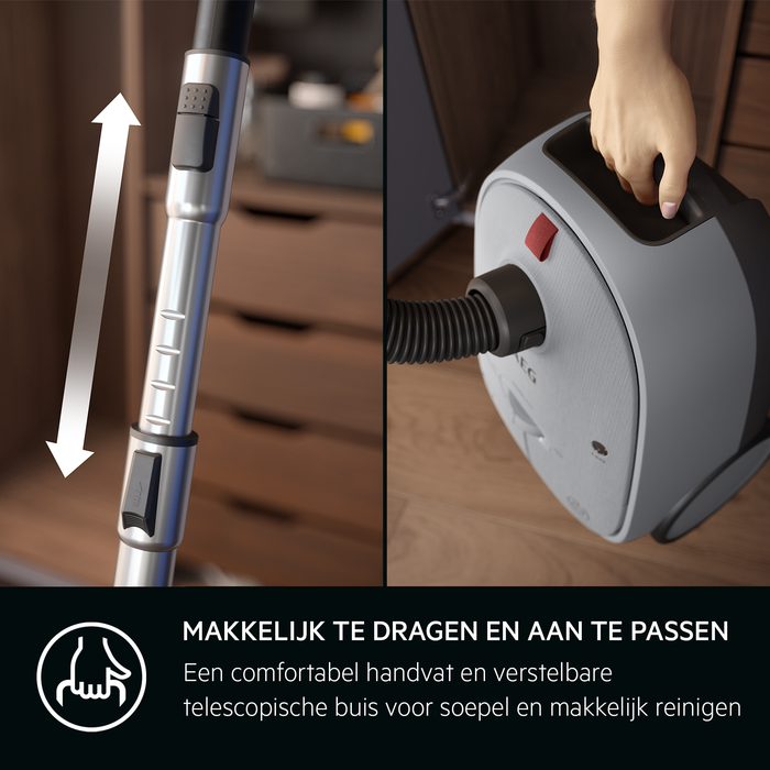 Stofzuiger met verstelbare handgreep, getoond in een kamer.