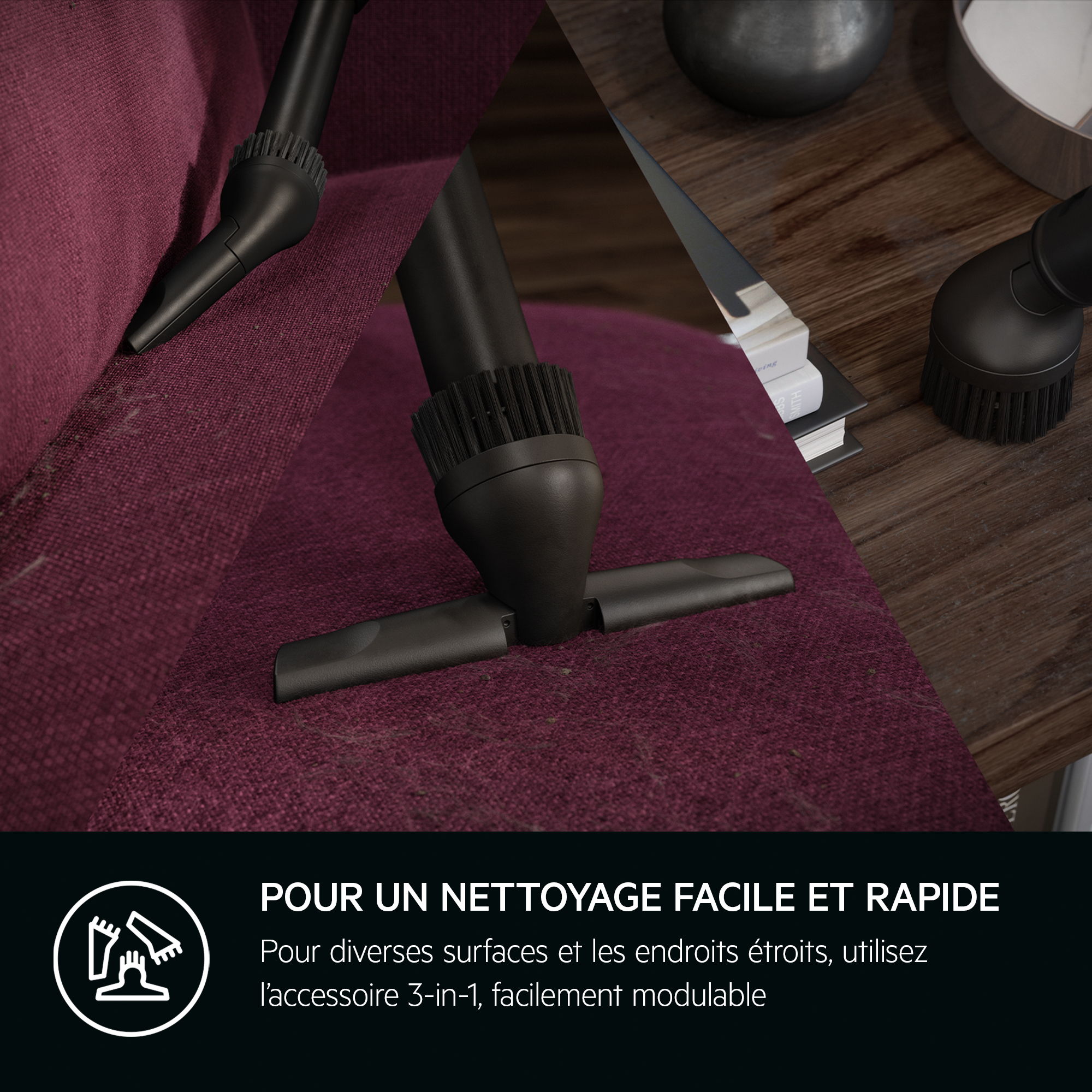 Des accessoires d'aspirateur noirs nettoient un canapé bordeaux foncé. De la poussière est visible.