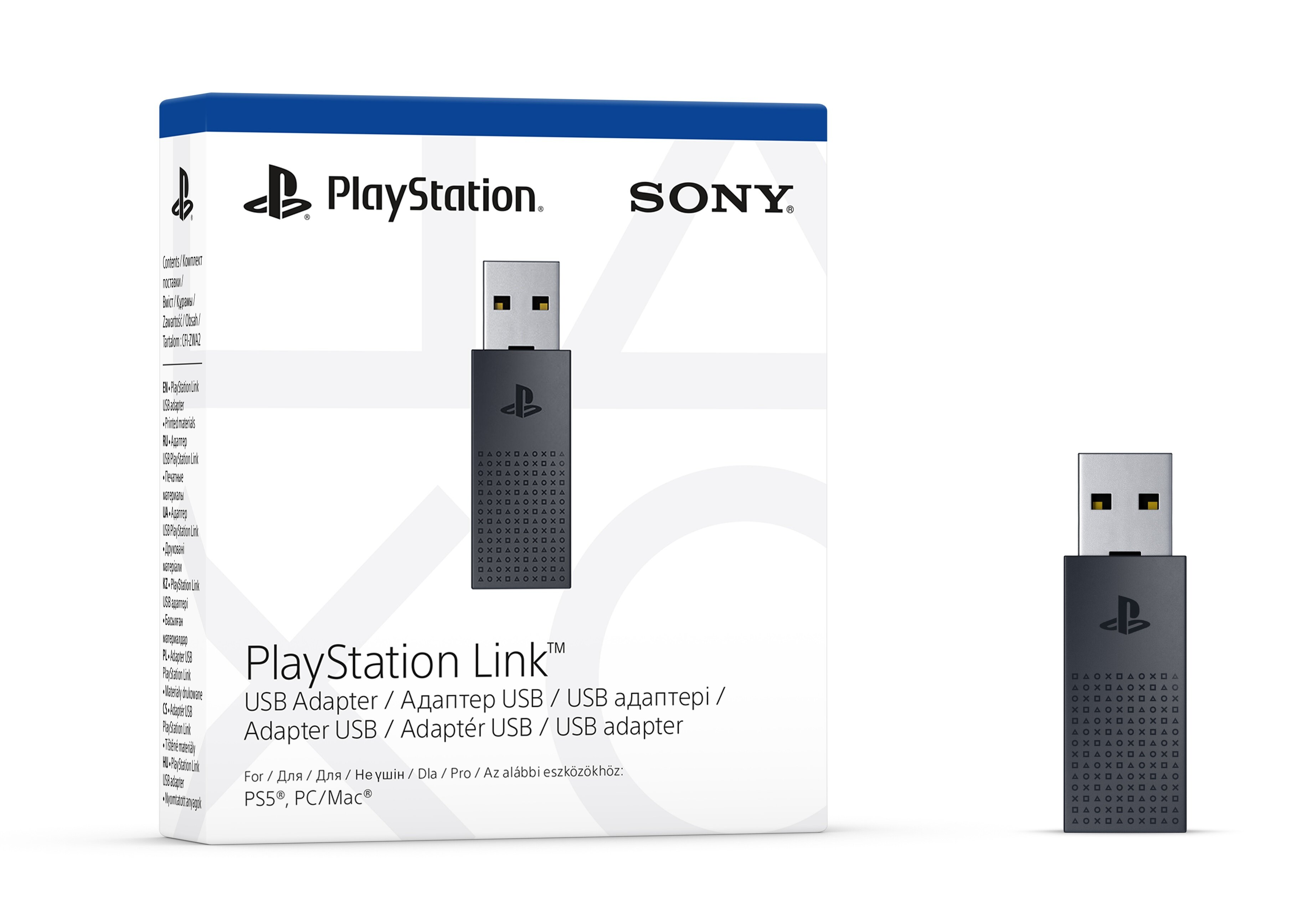 Adapter USB PlayStation Link w pudełku, adapter po prawej.