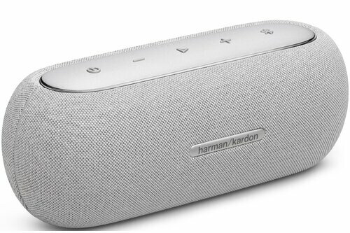 Biało-srebrny głośnik z nazwą marki.