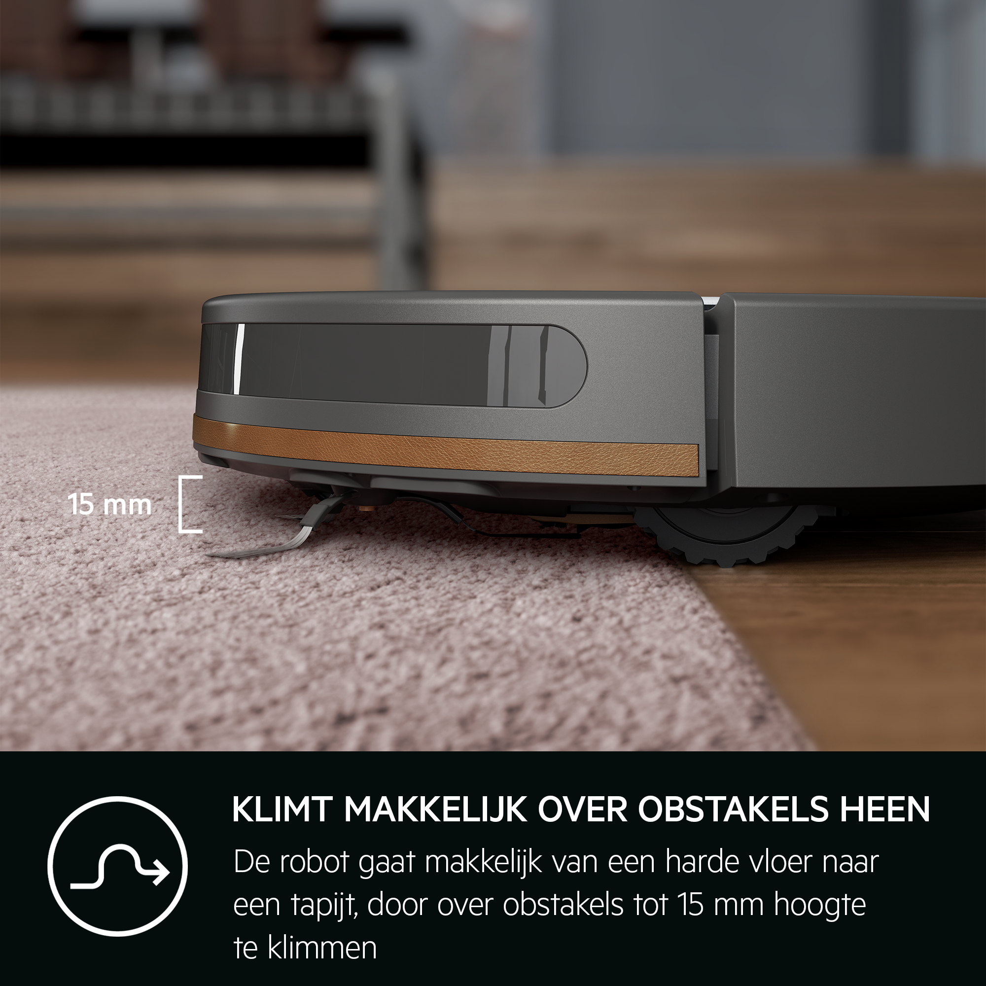 Robotstofzuiger op tapijt met een grafiek die zijn obstakel-klimvermogen toont.