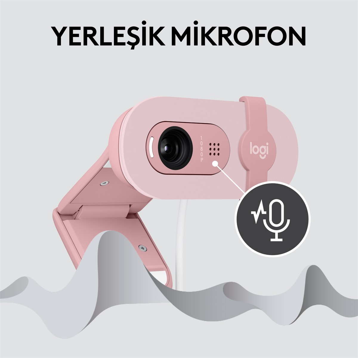 Mikrofon simgesi ve 'logi' kelimesi olan pembe bir web kamerası.