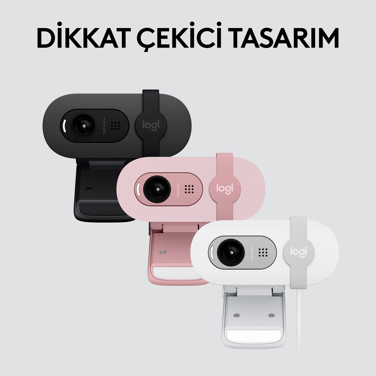 Üstte metin bulunan siyah, pembe ve beyaz üç web kamerası.