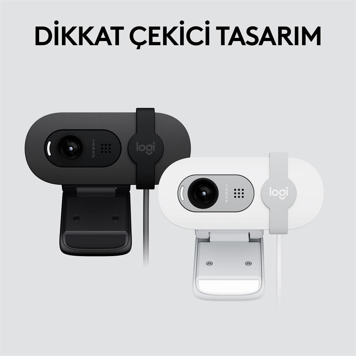 İki web kamerası, siyah ve beyaz, üzerinde 'Logi' yazısı bulunan, açık gri arka plan.