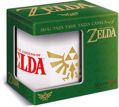 Una taza de Zelda blanca dentro de una caja verde con detalles dorados.