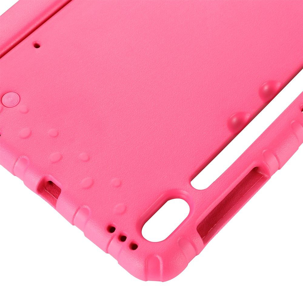 A pink tablet case, corner view, showing cutouts for ports and a textured surface.
