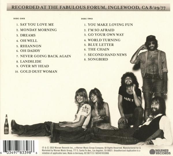 Album borító: Fleetwood Mac együttes tagjai pózolnak. Két lemez dalait listázza. Balra egy üveg ital.