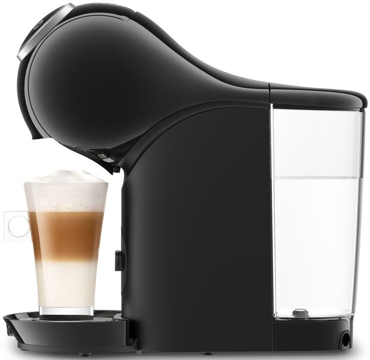 Black coffee machine with glass of layered drink. White background.