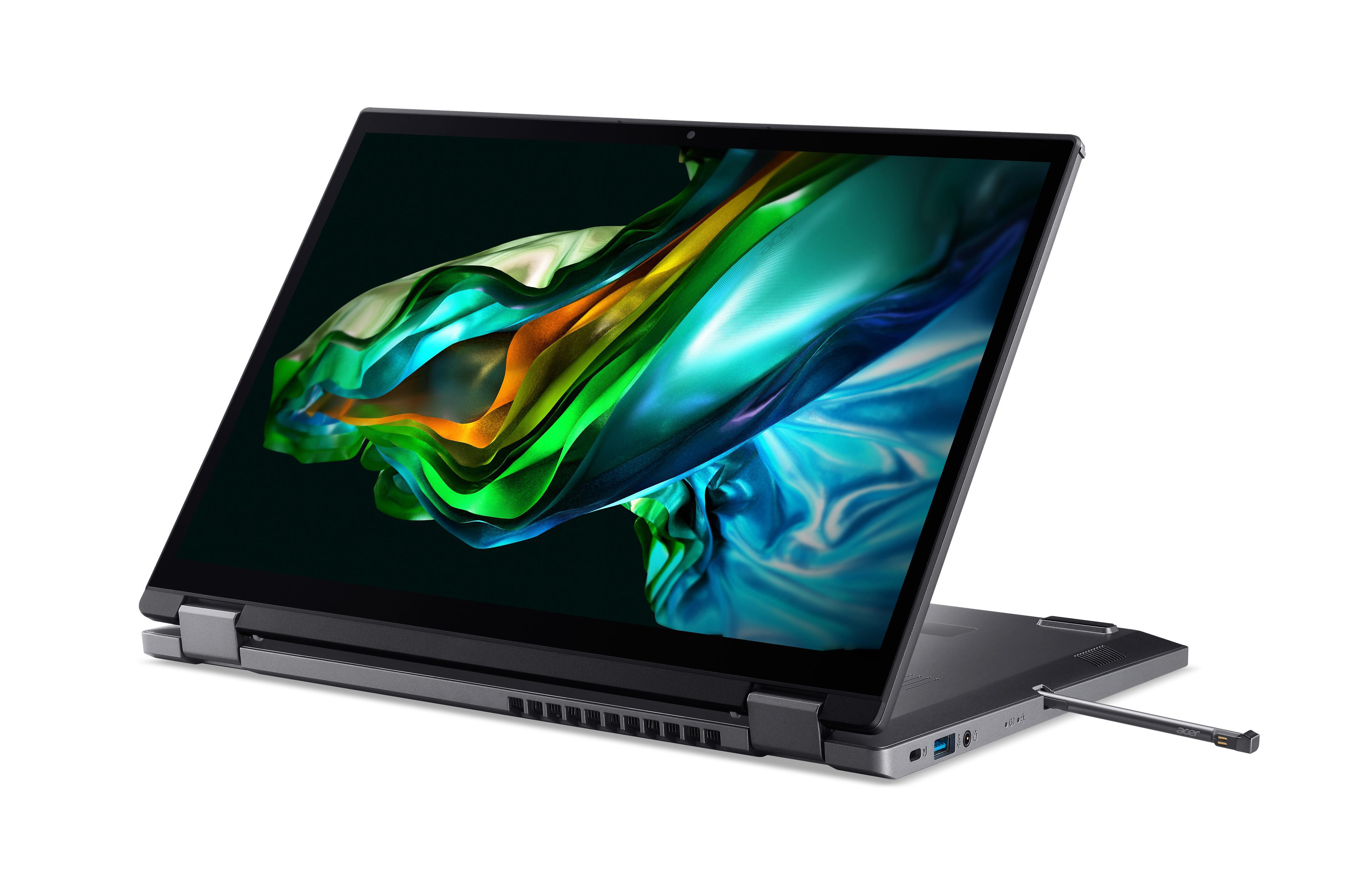 Schwarzer und silberner Laptop mit teilweise geöffnetem Bildschirm. Stift ist seitlich sichtbar.