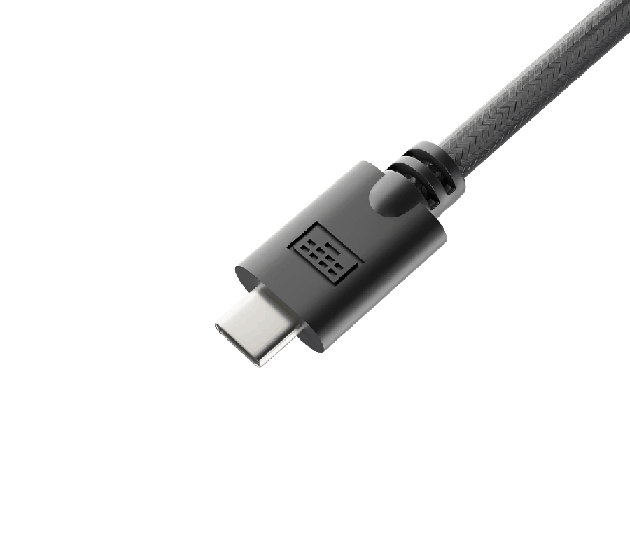 Primer plano de un conector de cable USB-C. Es negro con una punta plateada.