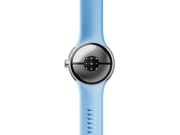 Parte trasera del smartwatch. Correa azul, sensores de frecuencia cardíaca visibles.