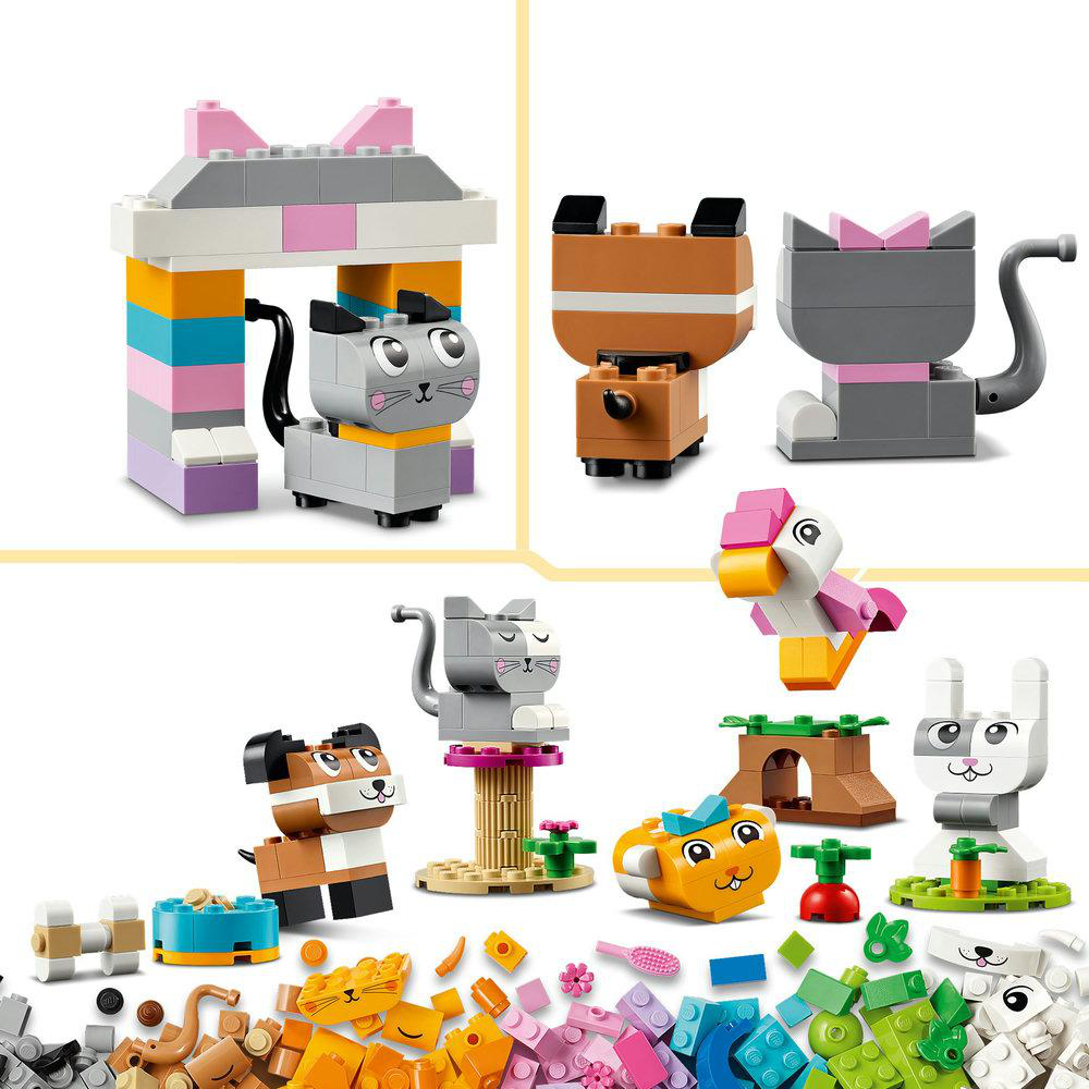 Eine Sammlung von LEGO Duplo Tierfiguren. Die Figuren umfassen eine Katze, einen Hund, eine Ente und ein Kaninchen.