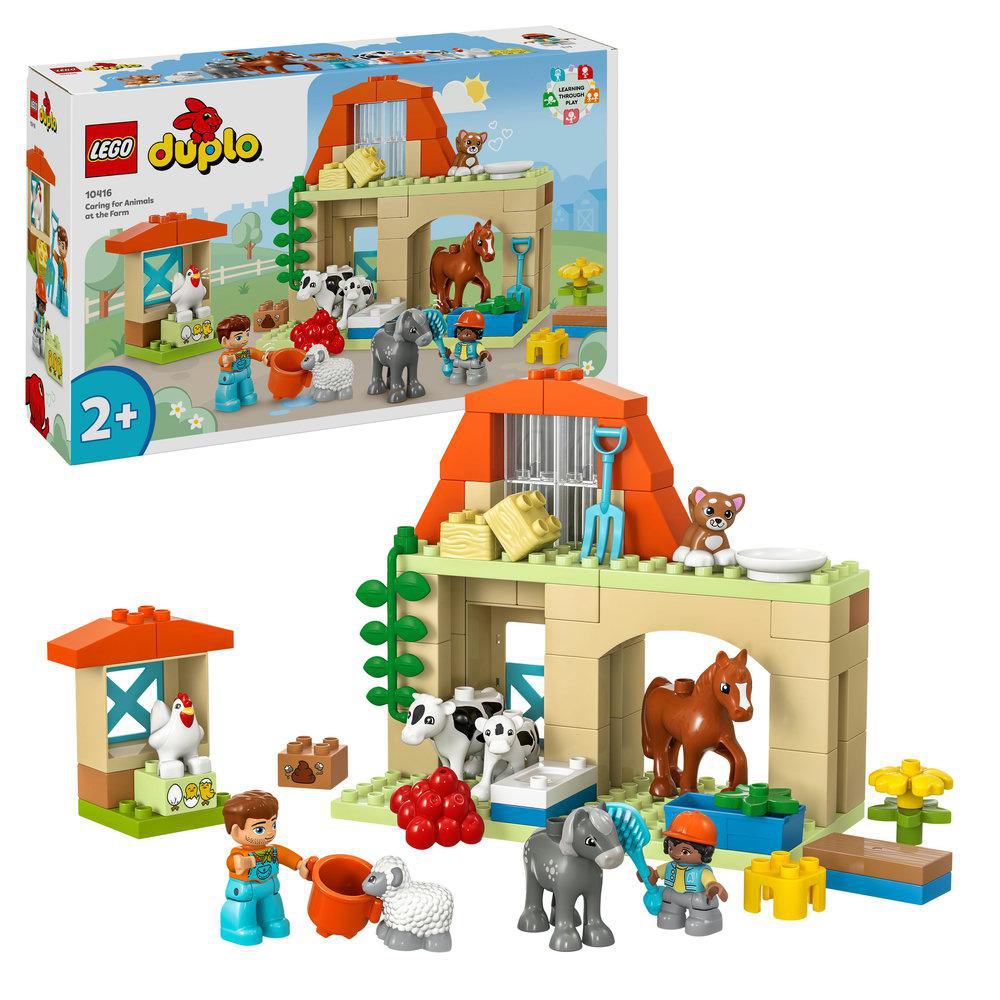 Lego Duplo Set eines Bauernhofs. Enthält Bauernhaus, Tiere und Figuren. Box zeigt das Set in Gebrauch.