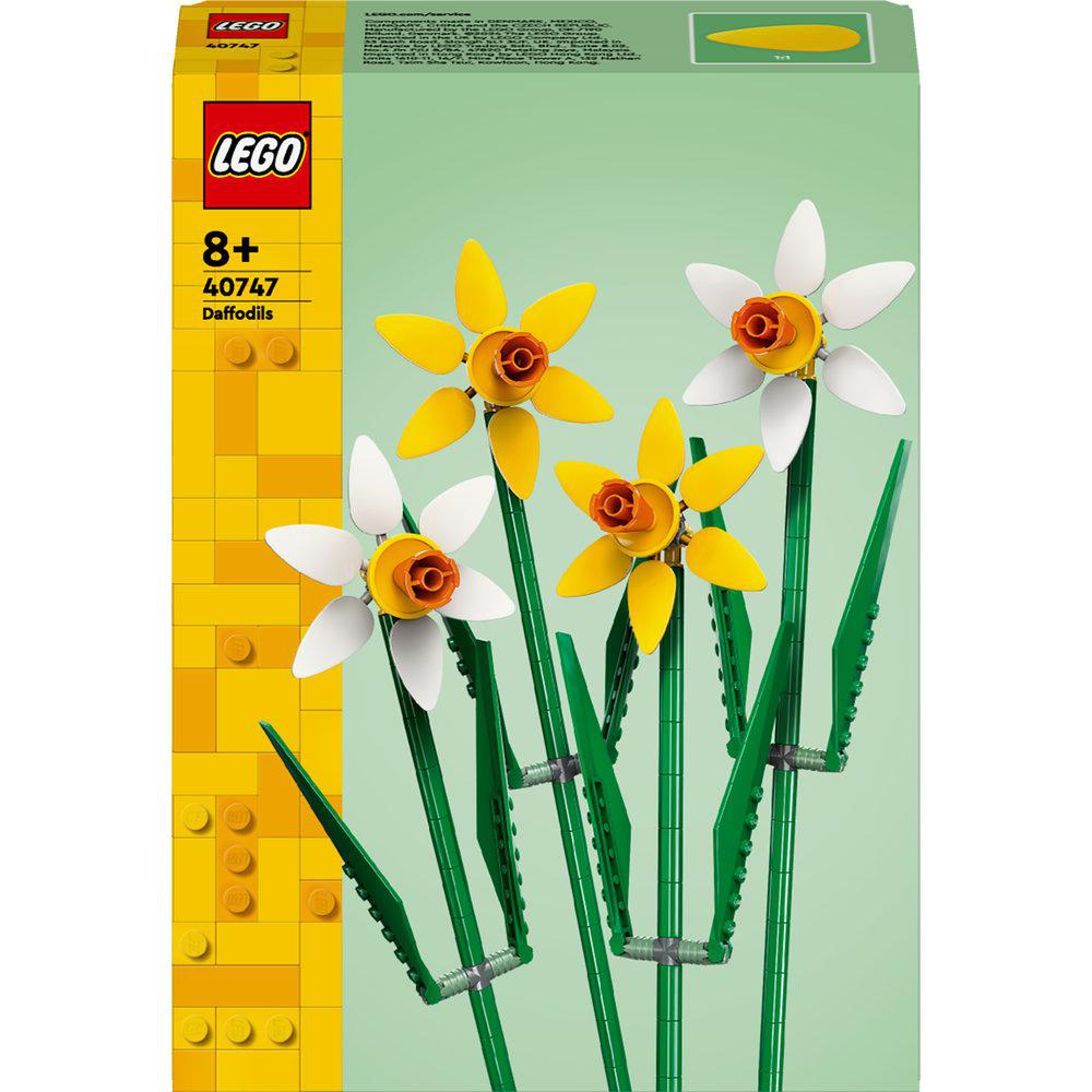 LEGO-Set aus gelben und weißen Narzissen. Die Box zeigt zusammengesetzte Blumen. Grüne Stiele und Blätter.