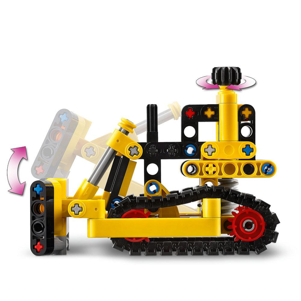 Ein Lego Technic Bulldozer Spielzeug. Es ist gelb und schwarz, mit Ketten und einem rotierenden Oberteil.
