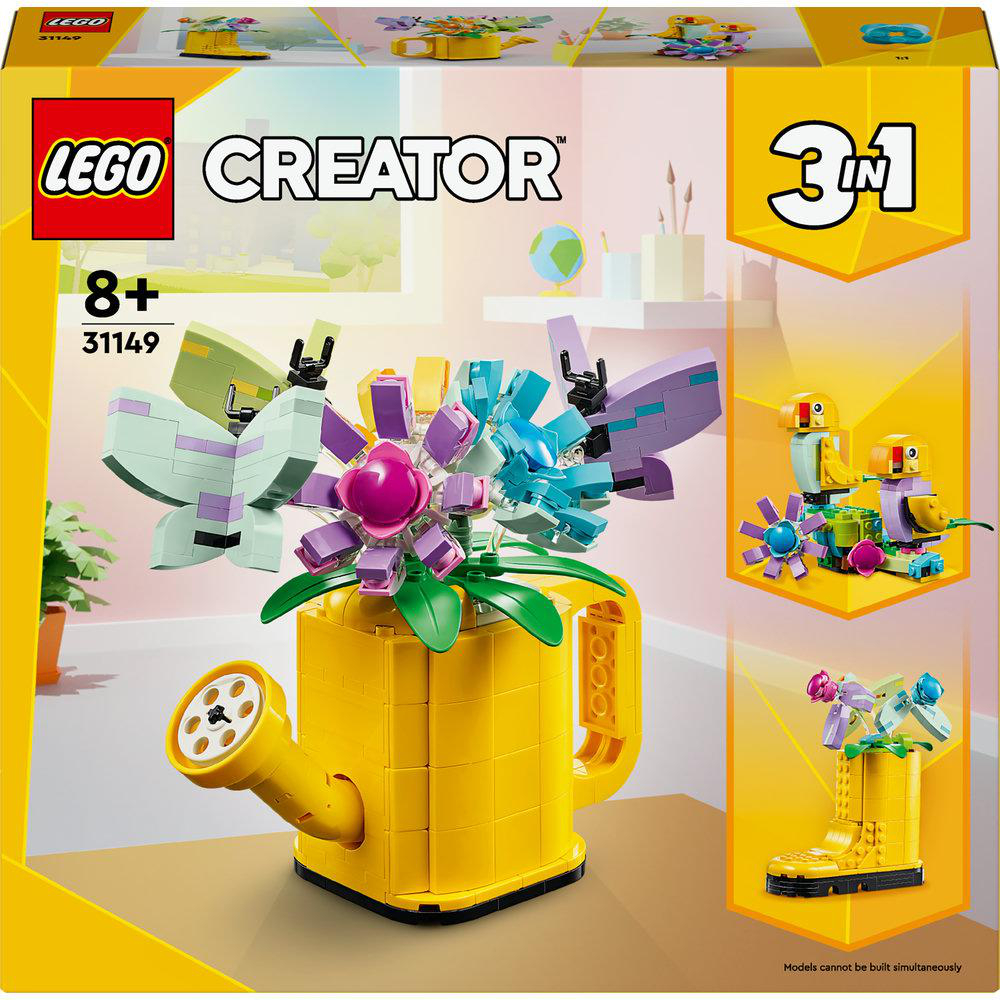 Eine LEGO Creator-Box mit einer gelben Gießkanne, Blumenbauten und kleineren Modellbeispielen.