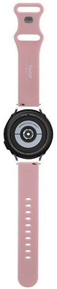 Różowy smartwatch na białym tle, z paskiem.