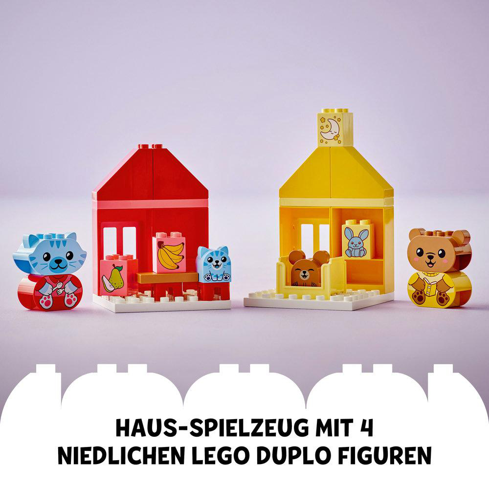 Ein Lego Duplo Set mit bunten Häusern und Tierfiguren.