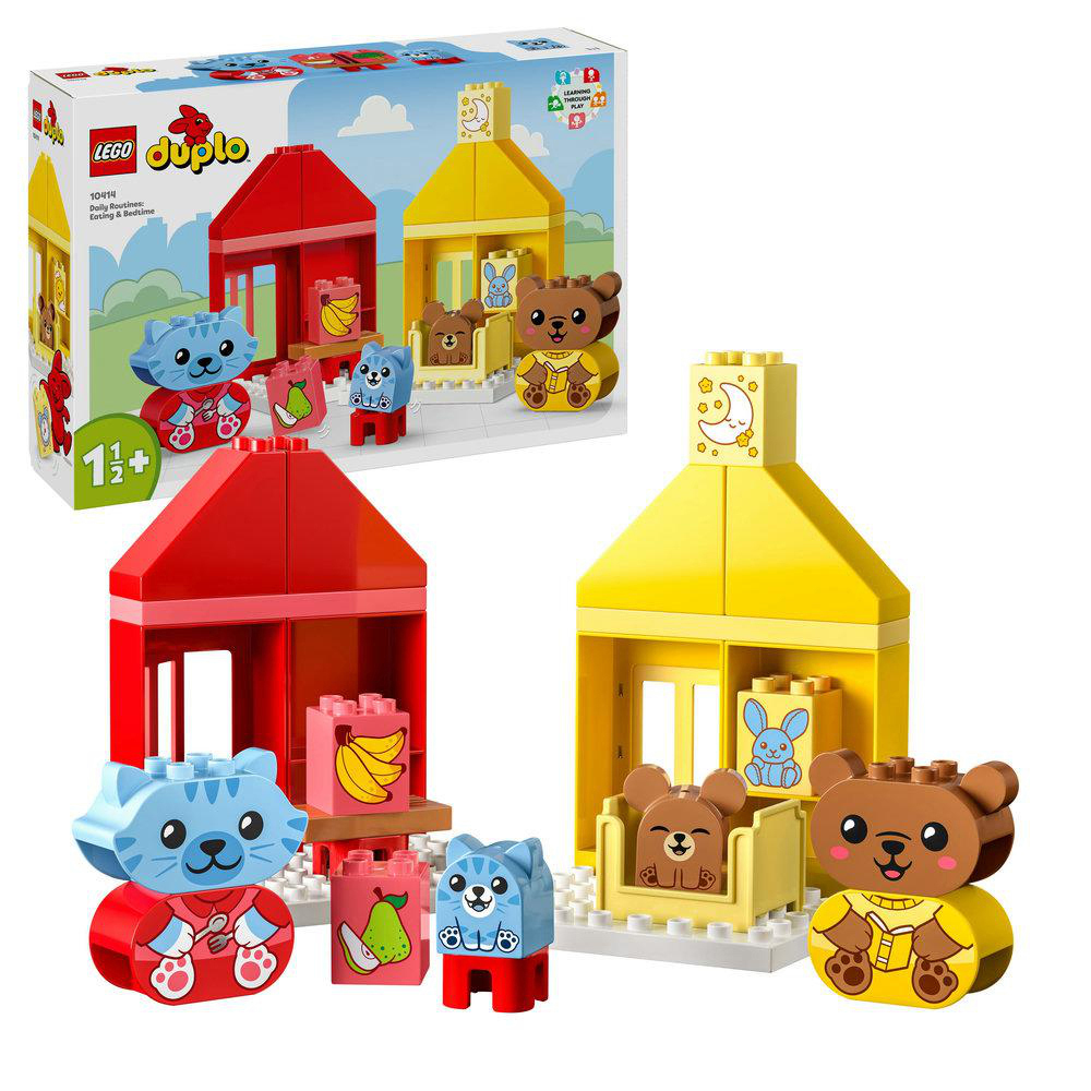 Lego Duplo Set mit Häusern, Katze, Bär und Banane. Rot, Gelb und Blau. Weißer Hintergrund.