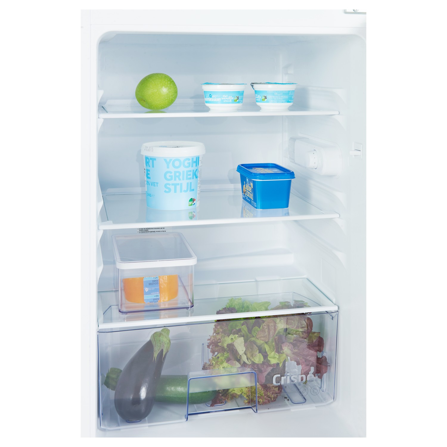 A refrigerator with shelves containing food items. Includes yogurt, fruit, and vegetables.