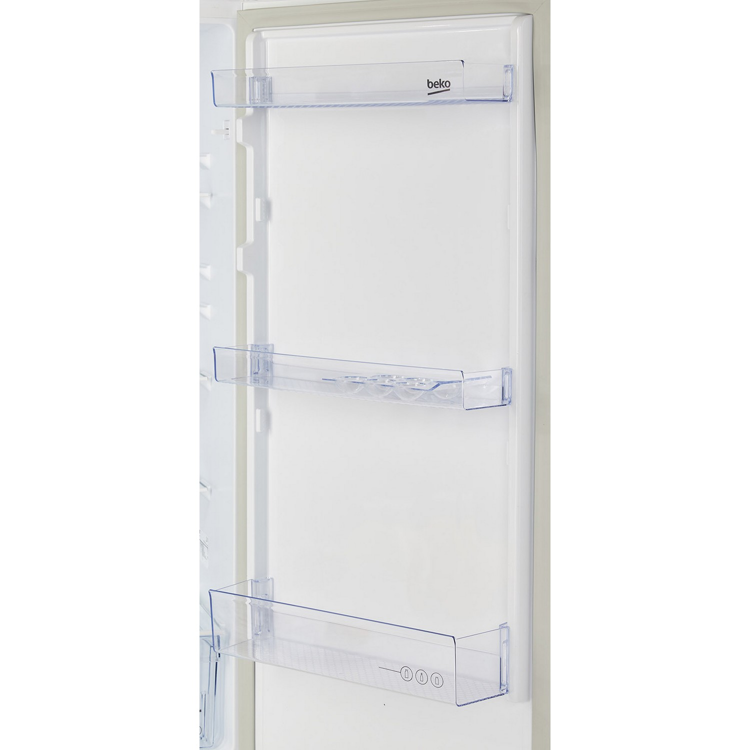 Inside of a refrigerator. White interior with transparent shelves and door racks.