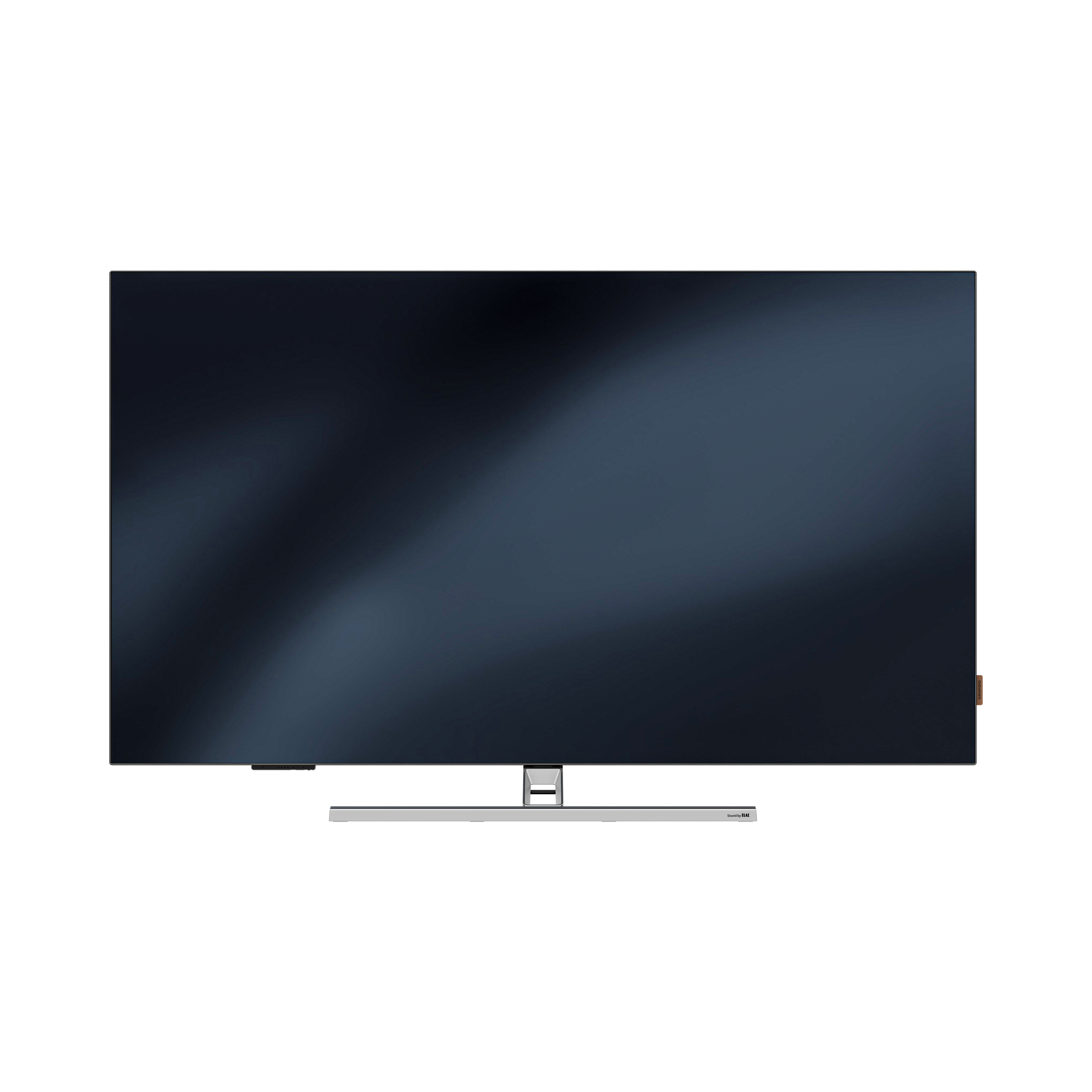 Siyah bir arka plan üzerinde büyük, karanlık bir TV ekranı, ince bir yansıma ile.