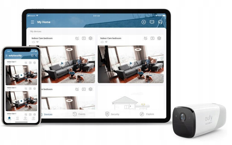 Tablet i telefon pokazują interfejs systemu bezpieczeństwa. Obok znajduje się kamera bezpieczeństwa.