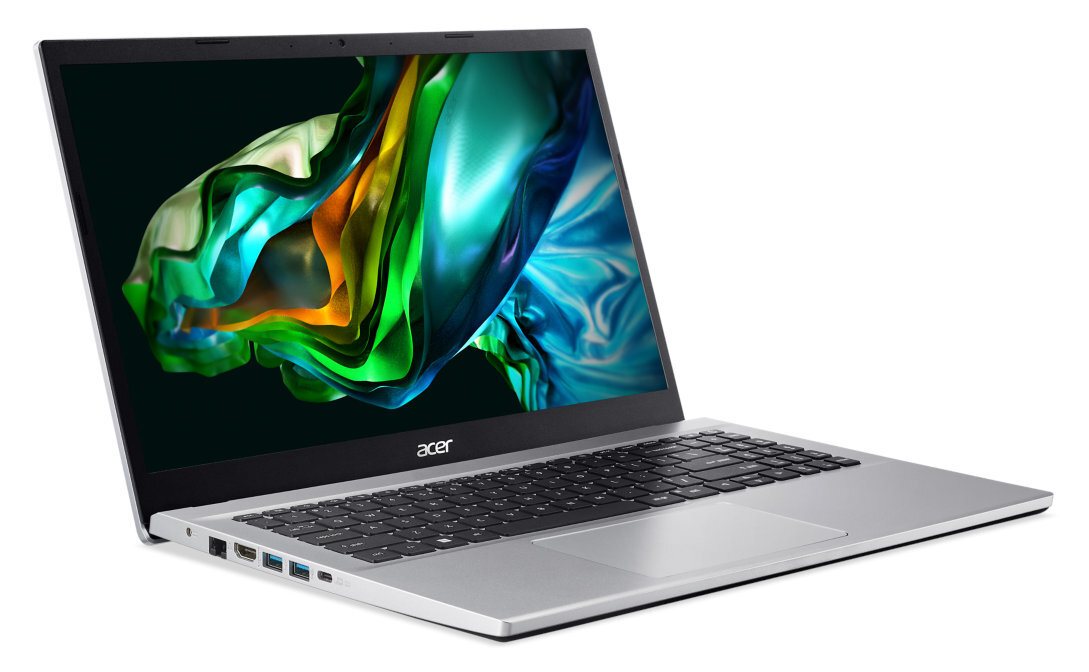 Srebrny laptop, otwarty, ekran z kolorowym abstrakcyjnym wzorem.