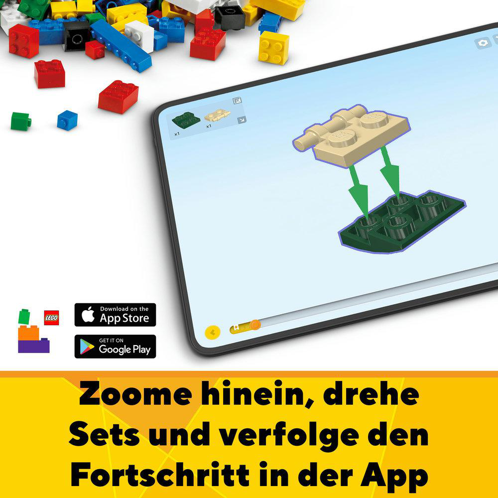 Tablet mit Lego-Anleitung. Lego-Steine ​​sind um den Bildschirm verstreut.