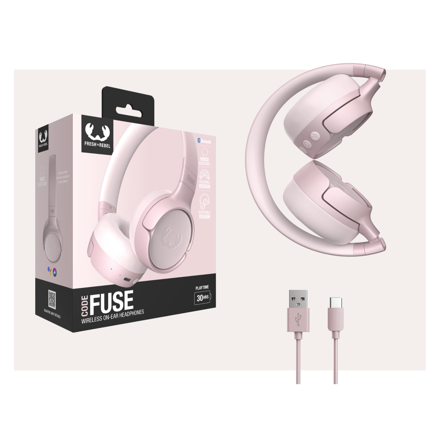 Roze draadloze hoofdtelefoon met een doos, kabels en een opgevouwen hoofdtelefoon.