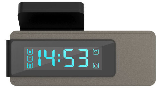 Zegar cyfrowy pokazujący godzinę 14:53 z różnymi ikonami. Na górze znajduje się podkładka ładująca.