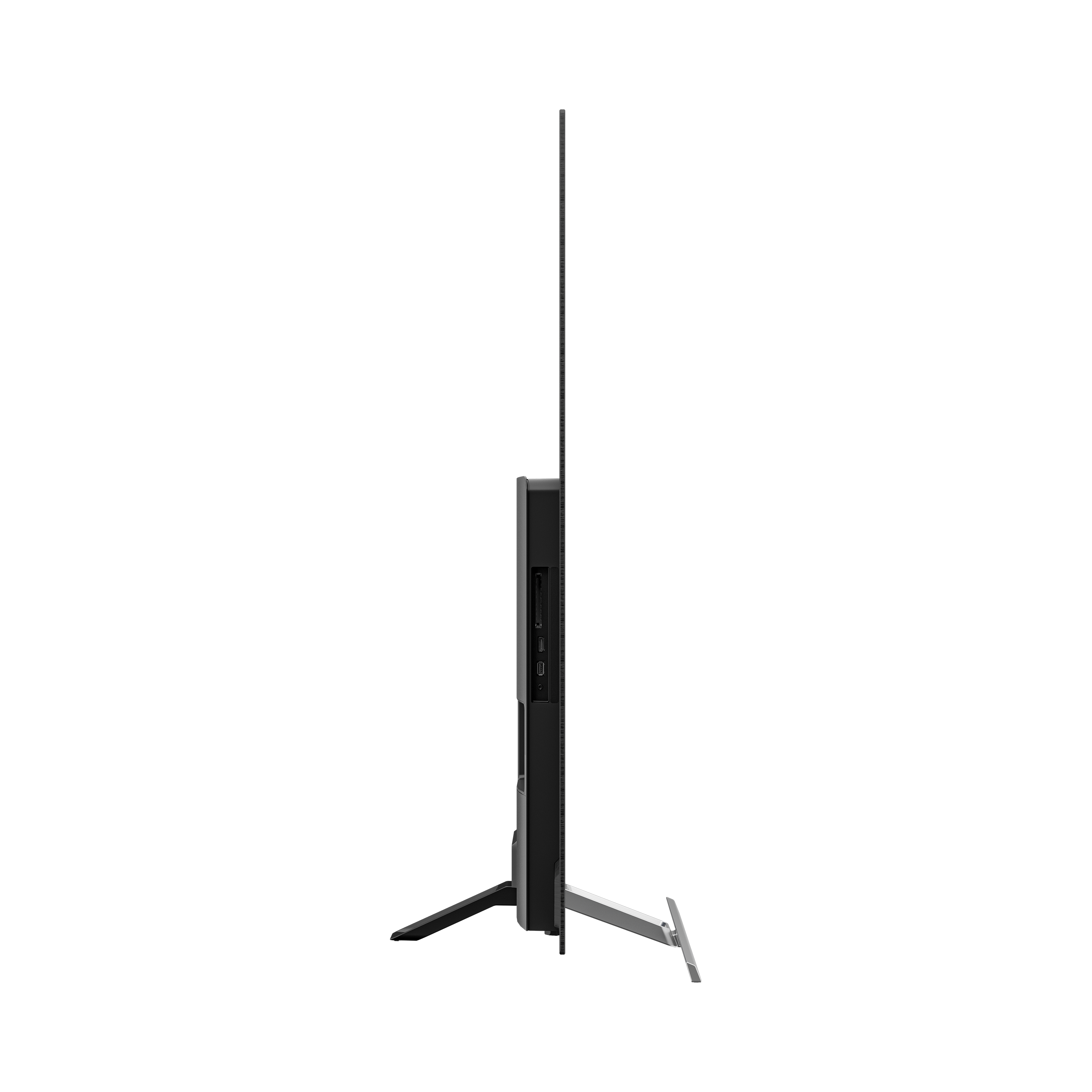 Siyah arka plan üzerinde, bir stand üzerinde duran büyük, modern bir siyah TV'nin yan görünümü.