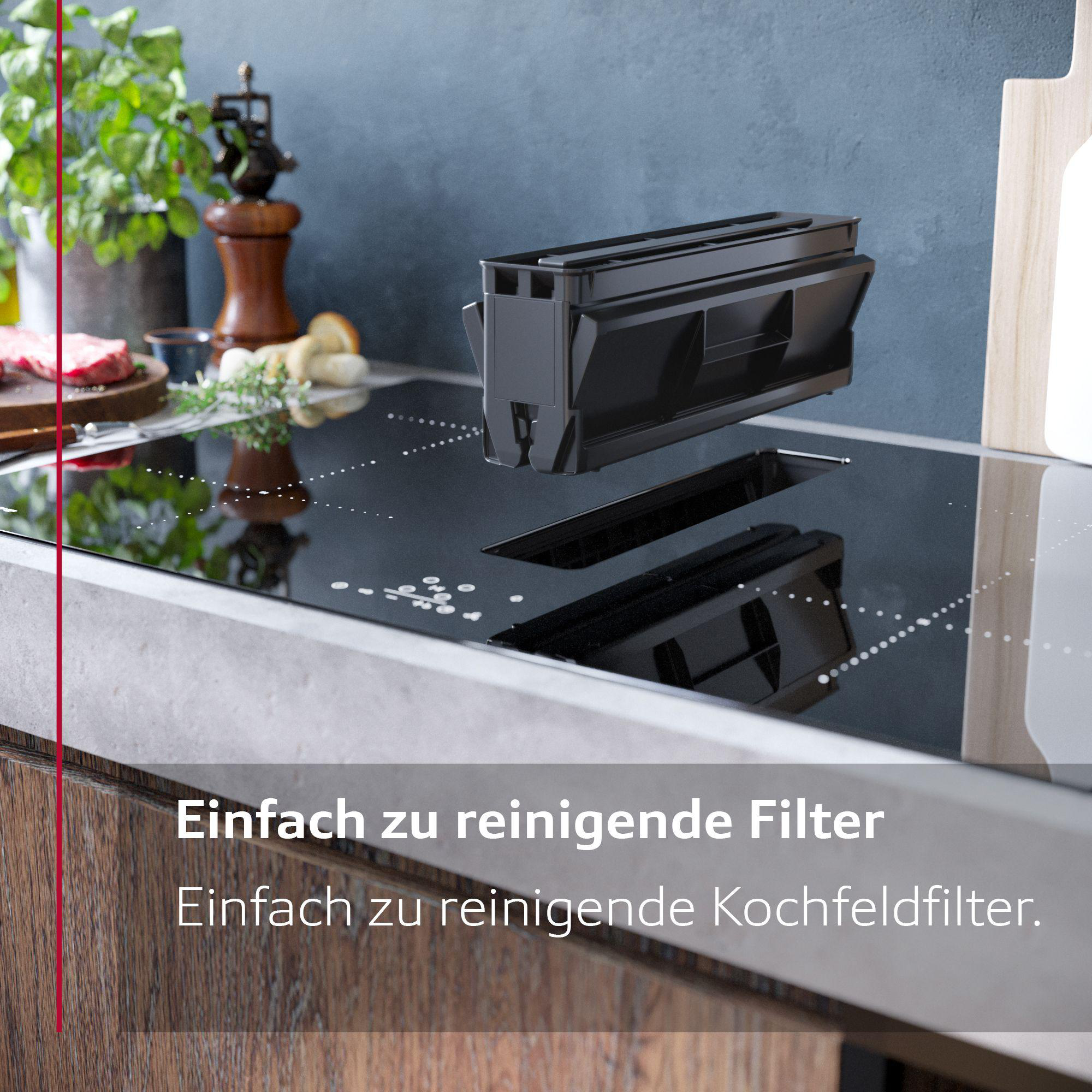 Küche mit Text. Schwarzer Filter wird in ein Kochfeld eingesetzt.