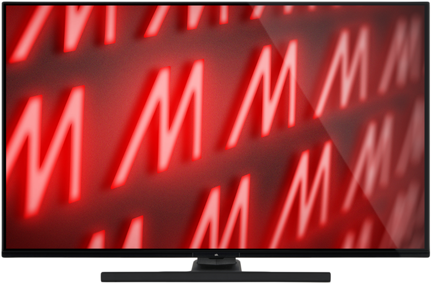 Egy TV-képernyőn egy piros 'M' betű minta látható. A háttér texturált, a TV fekete kerettel és talppal rendelkezik.