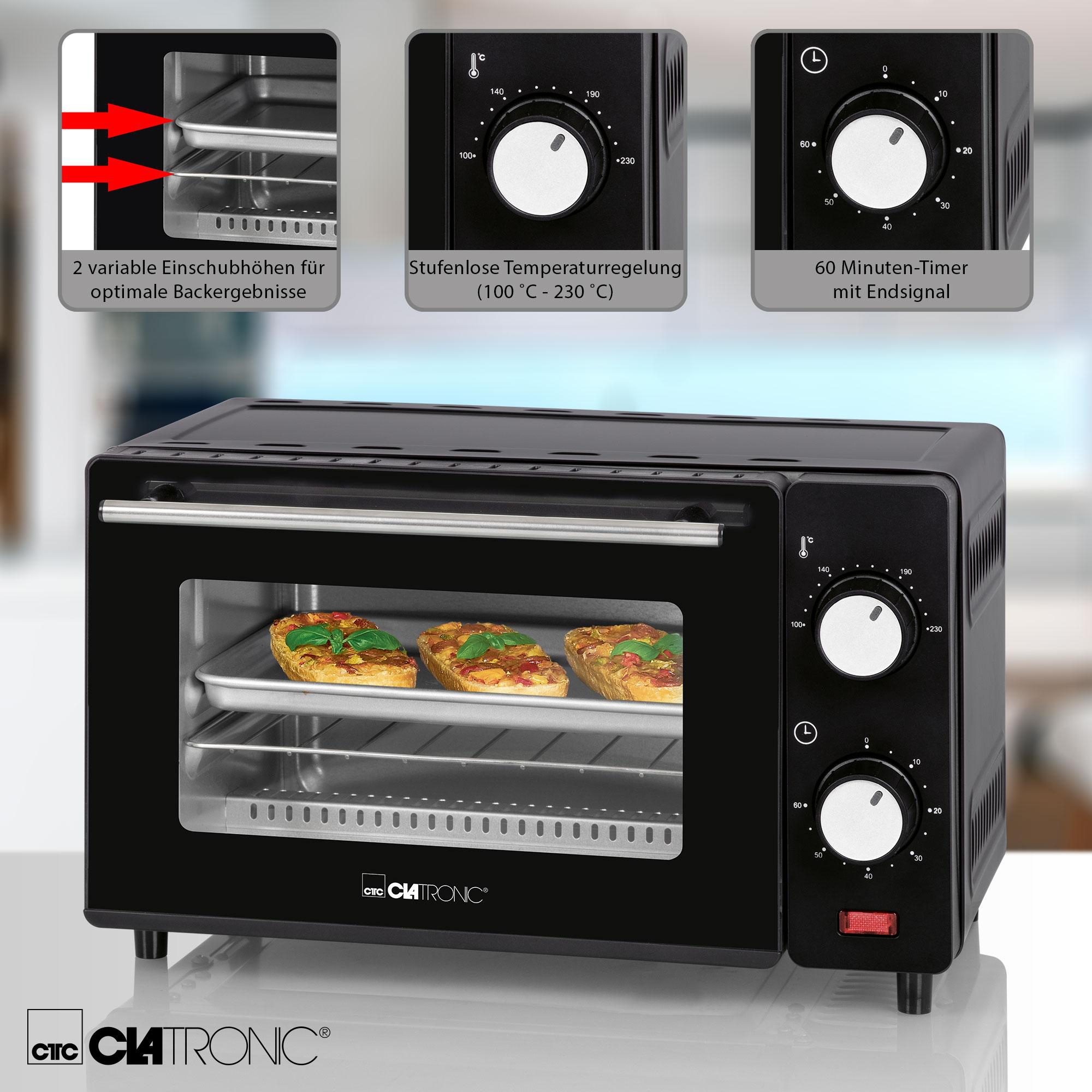 Schwarzer Mini-Backofen mit drei Drehreglern, Glastür mit Essen, schwarzer Hintergrund.