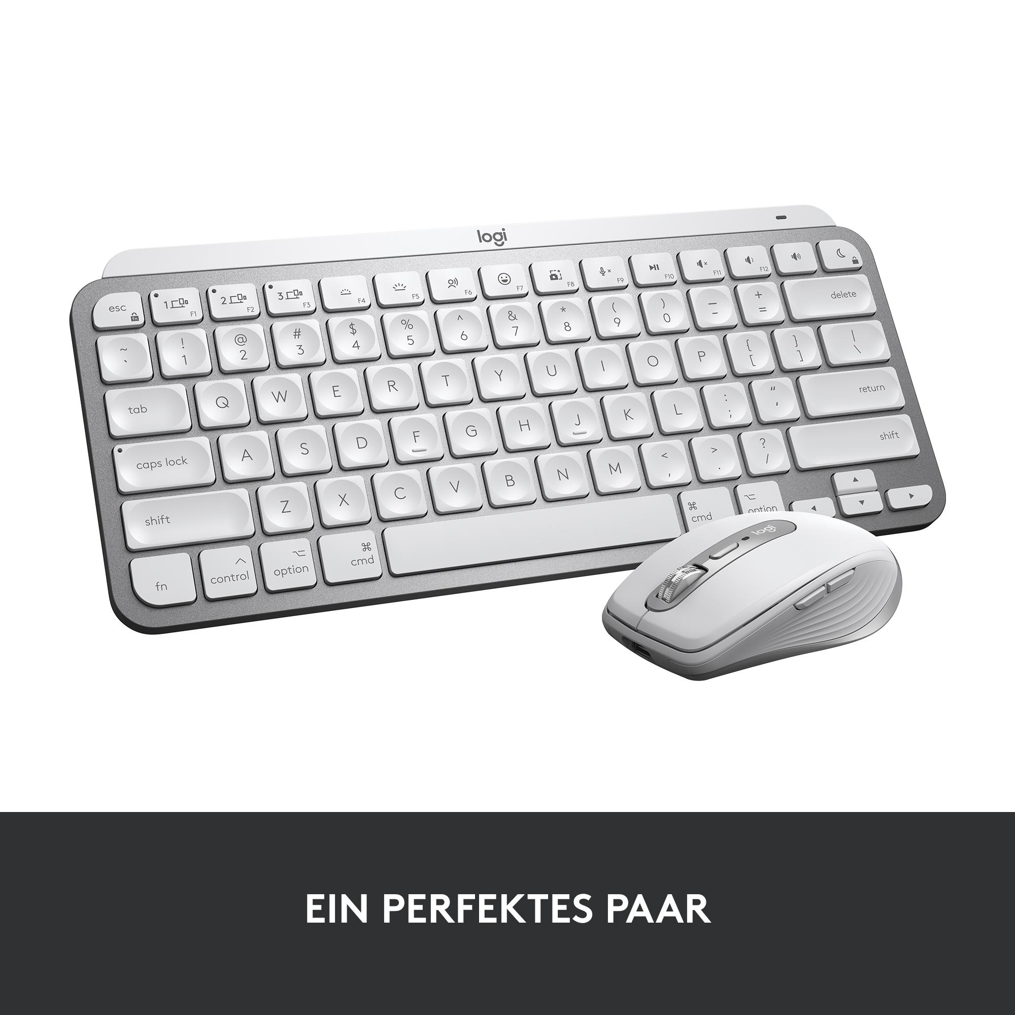 Ein weißes Tastatur- und Maus-Set auf einer weißen Oberfläche. Die Tastatur hat ein schlankes Design, die Maus ist kabellos.