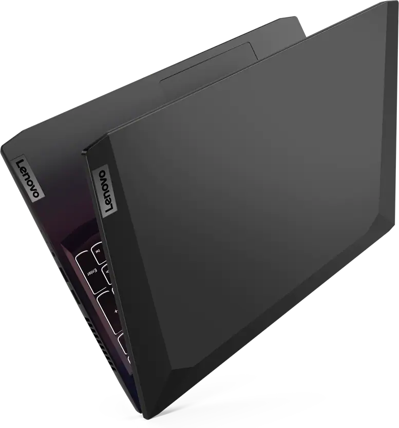 Fekete laptop Lenovo logóval a fedélen. Látható a billentyűzet. Fekete háttér.