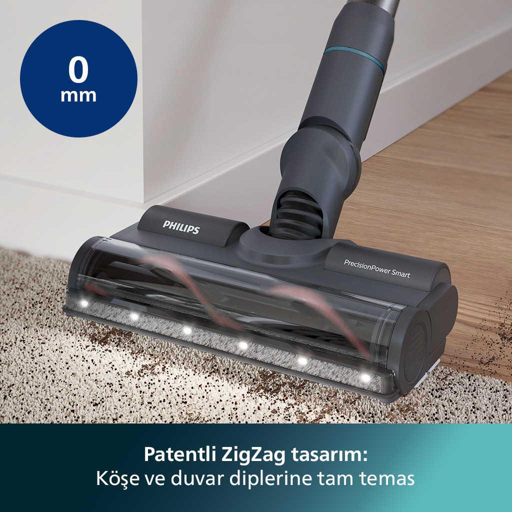 Halı üzerinde elektrik süpürgesi başlığı, Philips markası.