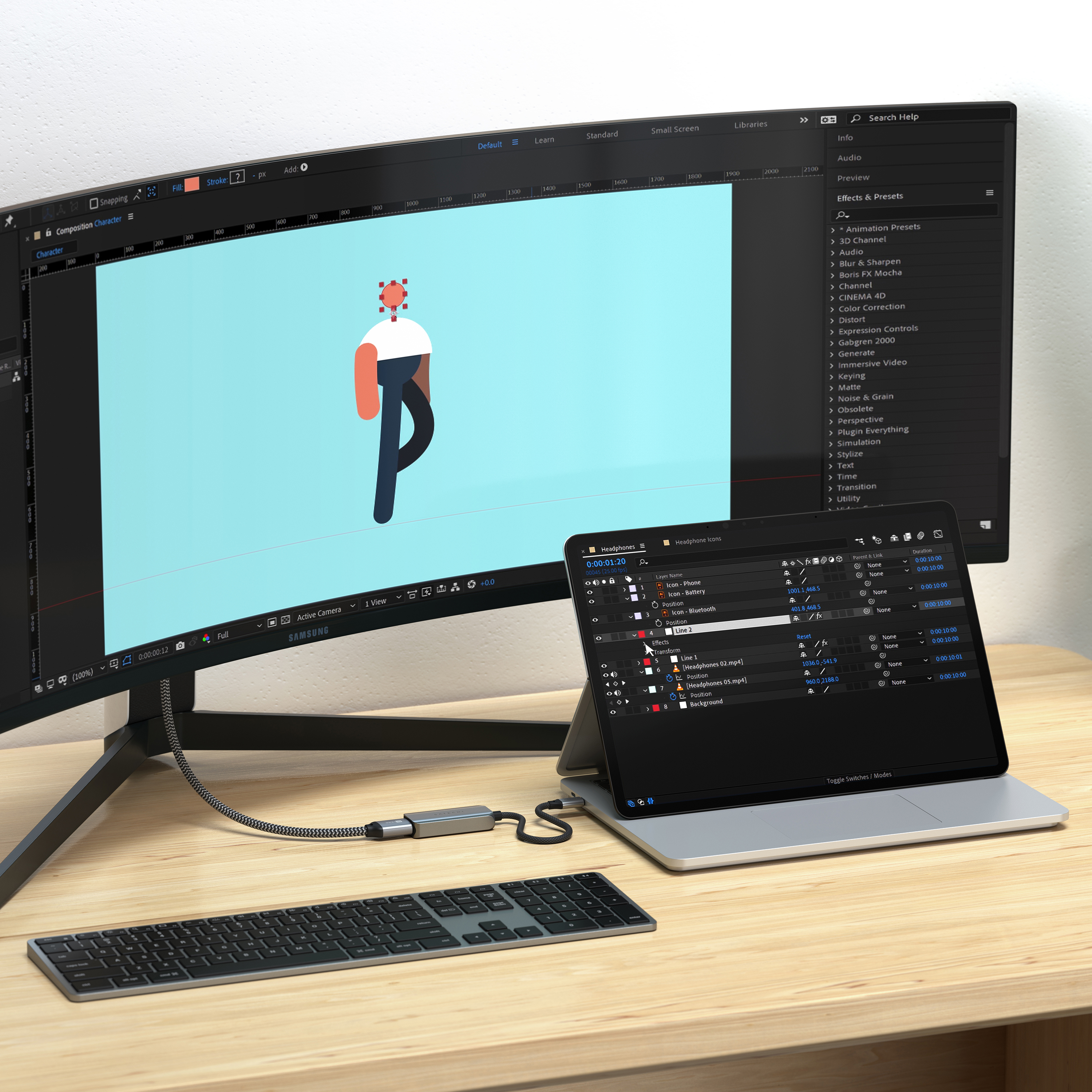 Ein Multi-Screen-Setup mit einem Laptop und einem gebogenen Monitor, auf dem eine Videobearbeitungssoftware angezeigt wird.